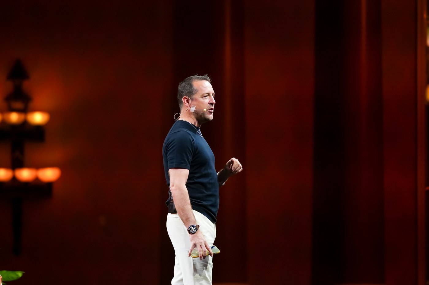 Josh Rathweg speaking on stage